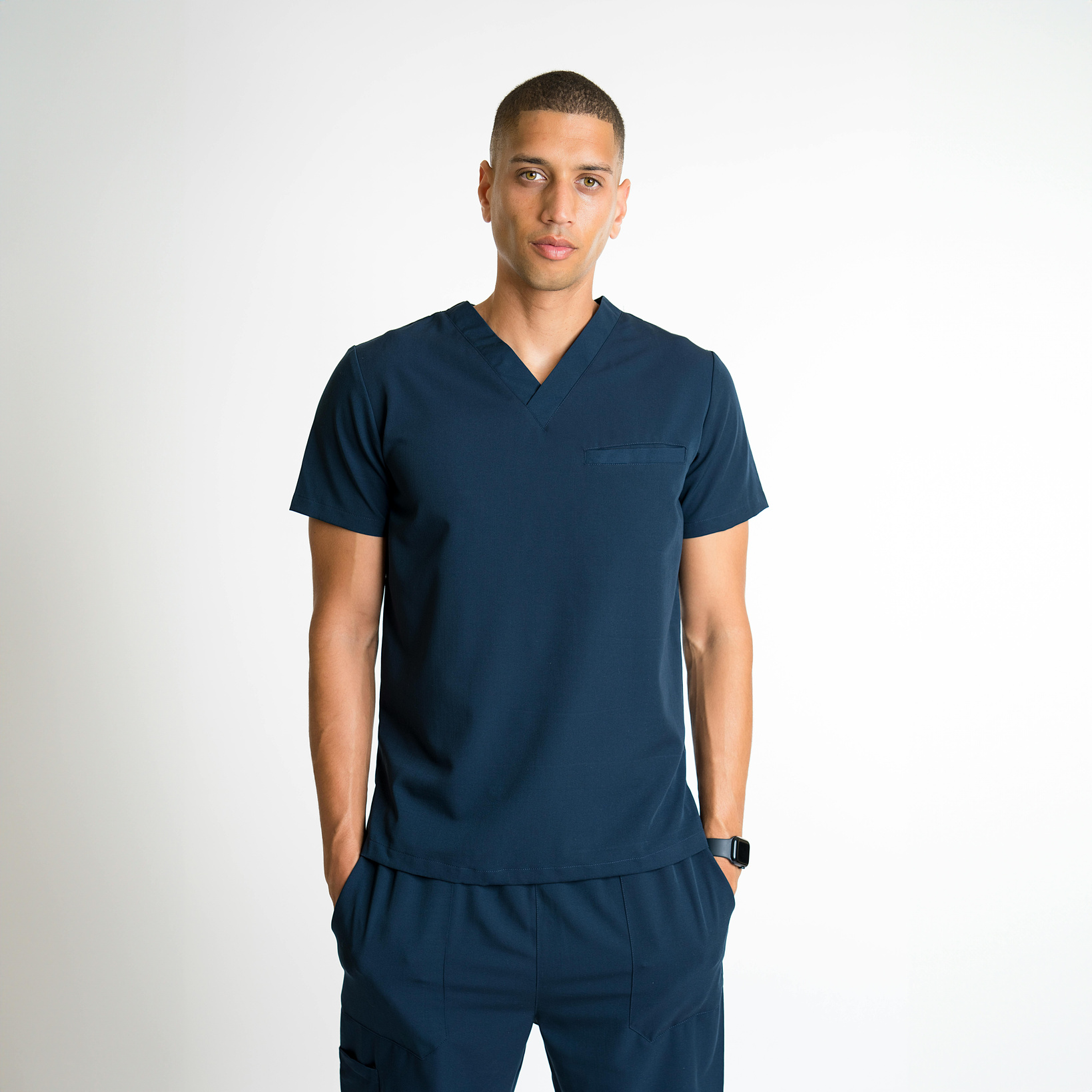 Medical Professional Wearing Scrubs Studio White Background